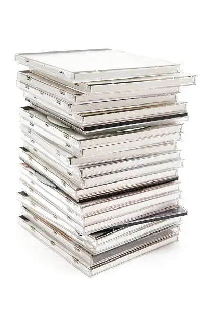 Stacked CDs isolated on a white background.