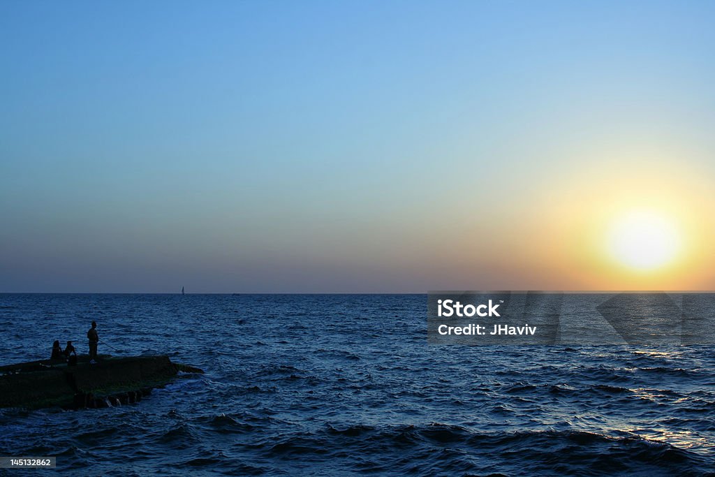 Red and orange sunset over the Sea. Above Stock Photo