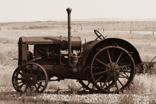 Antique tractor in Sepia
