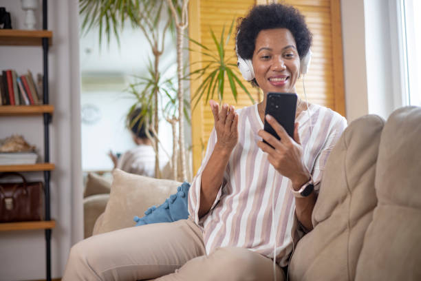 istock Happy black businesswoman using a smartphone 1451330042