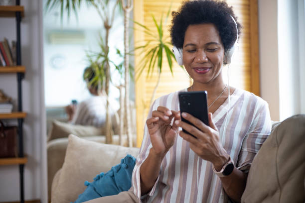 istock Happy black businesswoman using a smartphone 1451330469