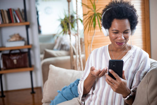 istock Happy black businesswoman using a smartphone 1451330872