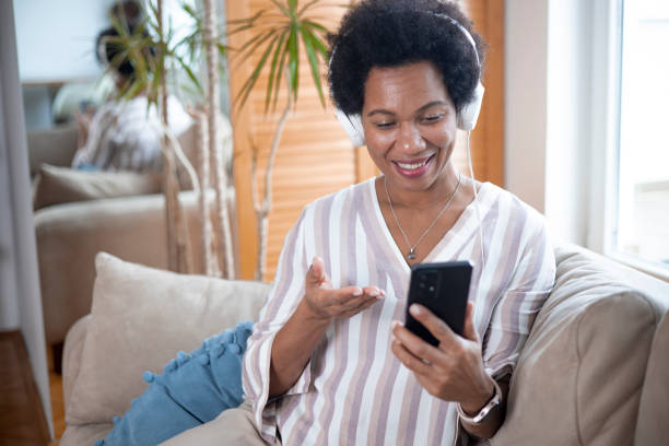 istock Happy black businesswoman using a smartphone 1451330883
