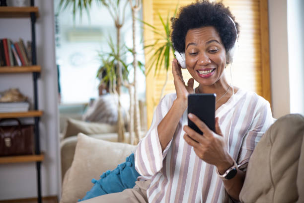 istock Happy black businesswoman using a smartphone 1451330923