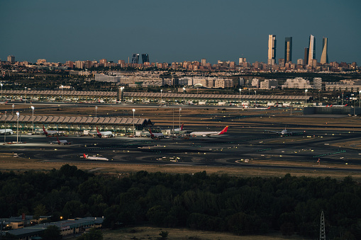 Madrid barajas airport and city skyline in the background.