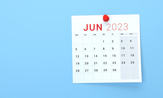 June 2023 Calendar Pinned On Blue Background.