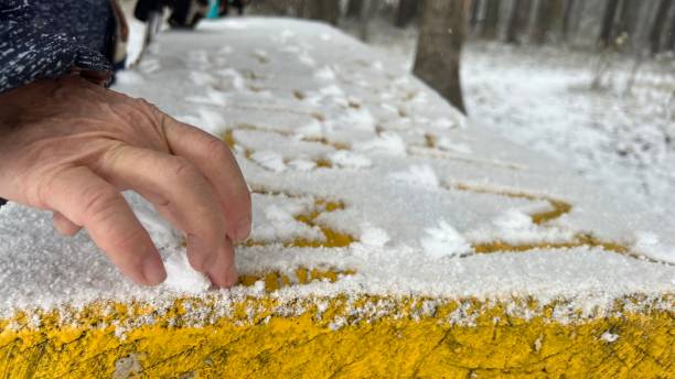 istock The hand writes letters on the snow on the table 1451343339
