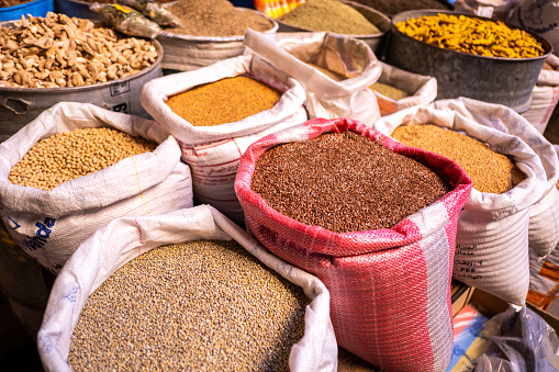 Detail of legumes and spices in the market of the medina of Fes.