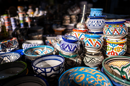Moroccan ceramics displayed in a medina store. Moroccan ceramics are known for their rich ornamentation.
