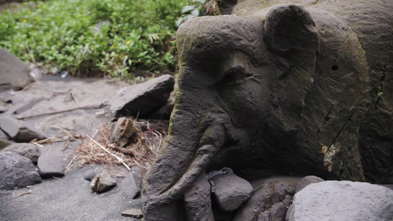 ancient sculpture of an elephant made of stone in Bali