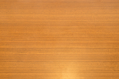Old brown wooden background with stripes was taken with automatic center selective focus used as background texture. Flat llaying photo