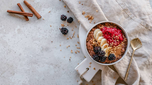 istock Chocolate oatmeal bowl background 1451366704