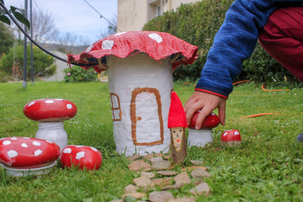 istock playing in the garden with do it yourself house 1451368374