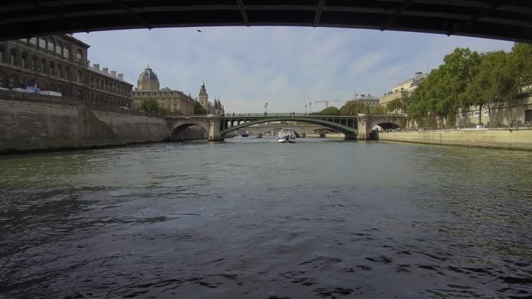 Passing under the Pont d'Arcole in Paris