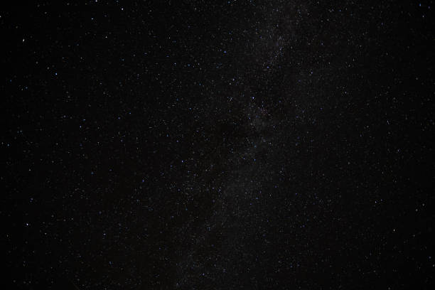 istock night starry sky with milky way 1451371729