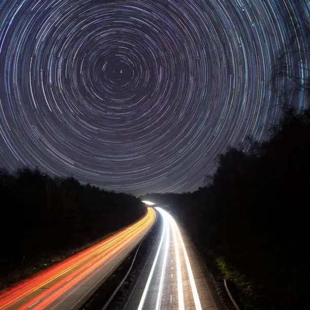 Star trail of a main road and the sky