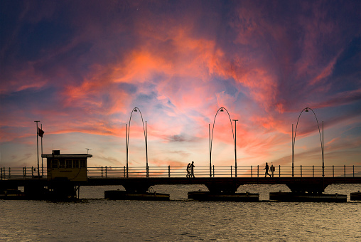 Silhouettes of the Queen Emma Pontoon Bridge in Willemstad, Curacao.