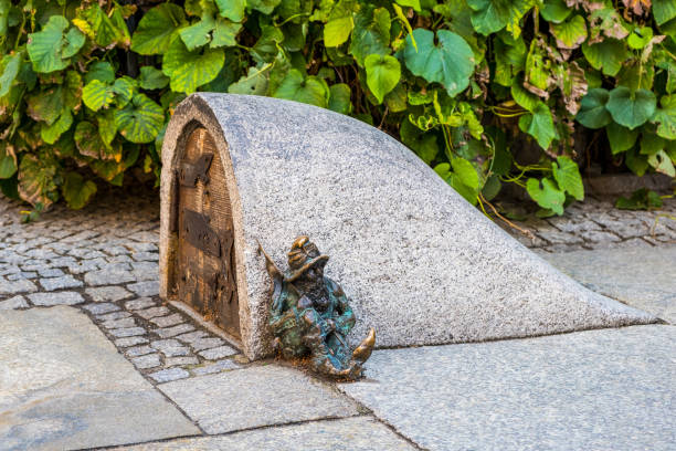 Wroclaw, Poland - September 27, 2019: Wroclaw Dwarf. The small figurines in the streets of Wroclaw old town . Hunting for dwarfs, tourist attraction
