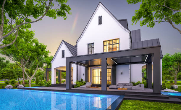 istock 3d rendering of white and black modern Tudor house in evening 1451377580