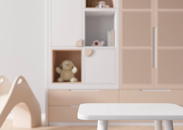 istock Empty white table top and blurred kids room interior on the background. Copy space for your object, product, toy presentation. Display, promotion, advertising. 3D rendering. 1451380335