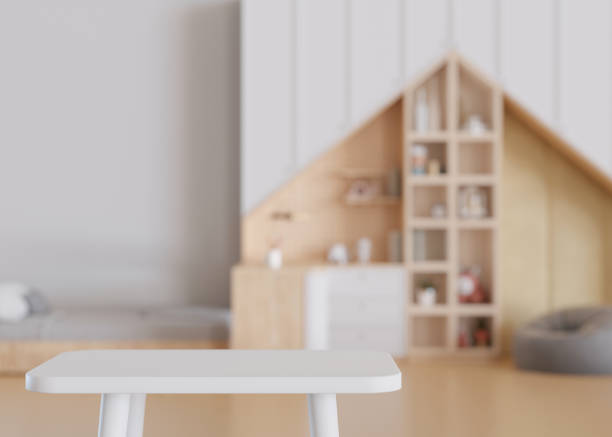 istock Empty white table top and blurred kids room interior on the background. Copy space for your object, product, toy presentation. Display, promotion, advertising. 3D rendering. 1451380374