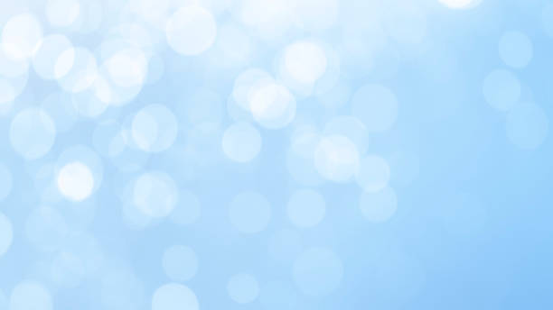 istock Beautiful Shiny White Bokeh Lights Abstract Background. Bokeh Magic Glitter Lights on Blue Background. Defocus, Blurred Celebration Festive Christmas Backdrop. 1451380494