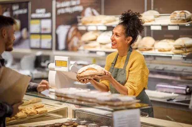 Retail clerk working in a supermarket