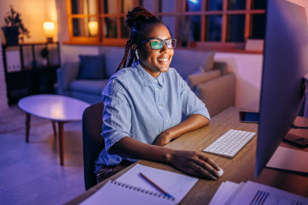 istock Businesswoman working late night from her home office 1451397155