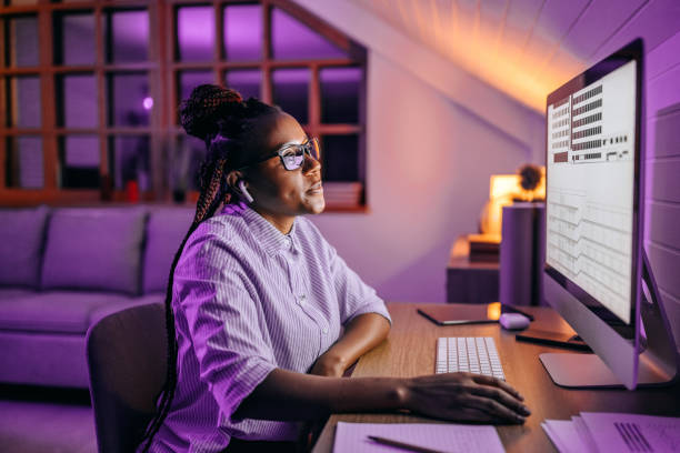 istock Businesswoman working late night from her home office 1451397225