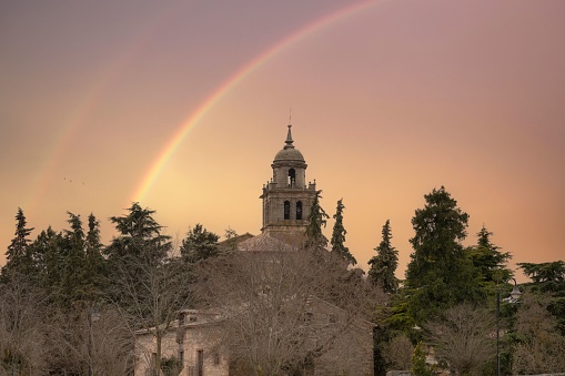 A scenic view of the collegiate church in Soria during sunset in the town of Medinaceli, Spain