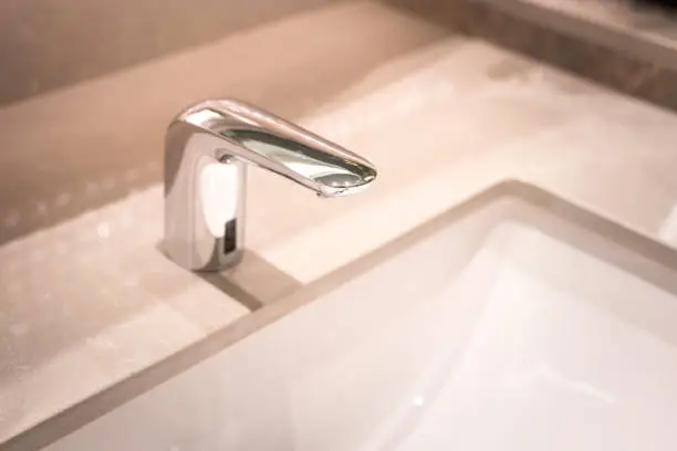 Photo of A luxury  hand washing faucet.