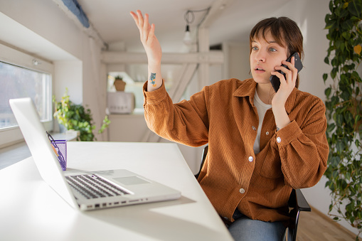 Young businesswoman working from home