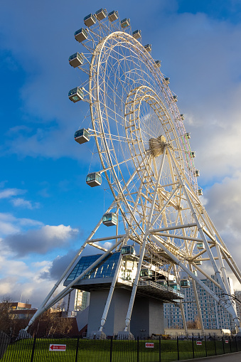 Moscow, Russia - 13 November, 2022: view on Sun of Moscow is a giant ferris wheel in VDNKh park, Moscow, Russia