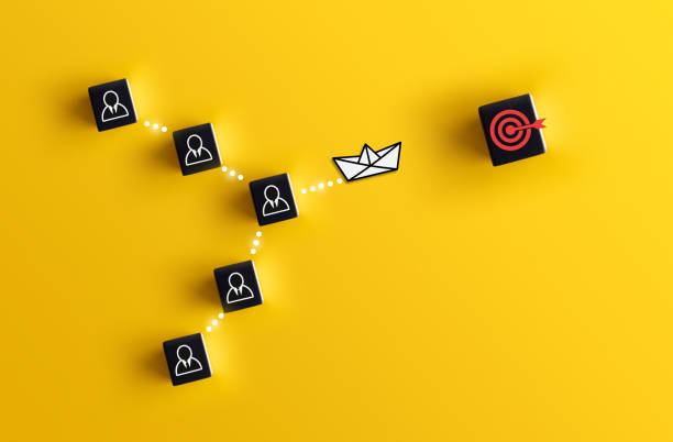 istock work together with one's team members toward one's goal 1451421178
