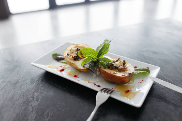 istock Freshly baked pears on a gray background. Nice dessert. Copy space. 1451422172