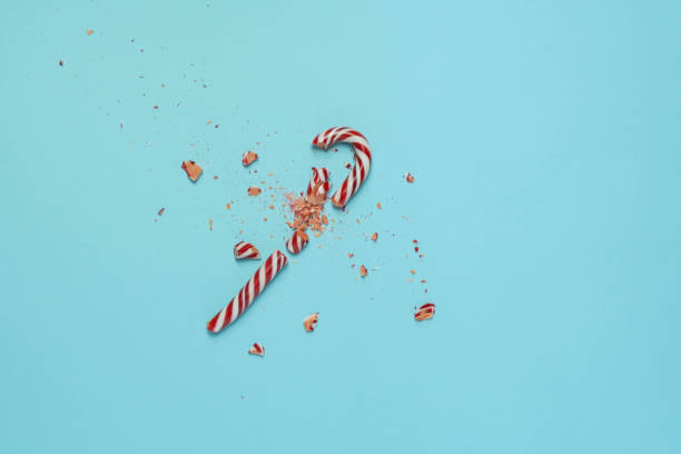 istock Christmas, New Year. Broken New Year's lollipop. Top view 1451423649