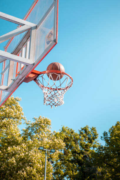 istock basketball rim ball in net 1451427162