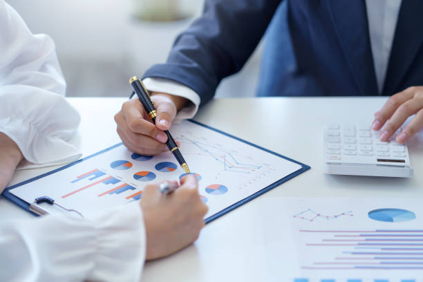 istock Business people meeting working project developing business strategy doing paperwork analysis in office. 1451430606