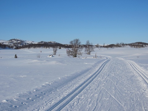 Scenic winter landscape in Rauland with cross-country skiing track