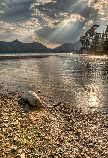 Crepuscular Rays Over Catbells and Causey Pike (Derwentwater) stock photo