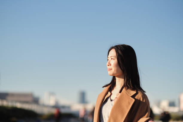 istock Profile view of businesswoman 1451437595