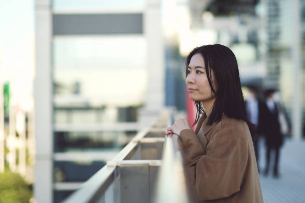 istock Profile view of businesswoman 1451437596