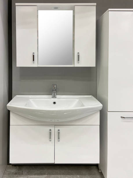 istock Modern bathroom sink, cabinets and mirror (Mirror Frame with Clipping Path) 1451440405