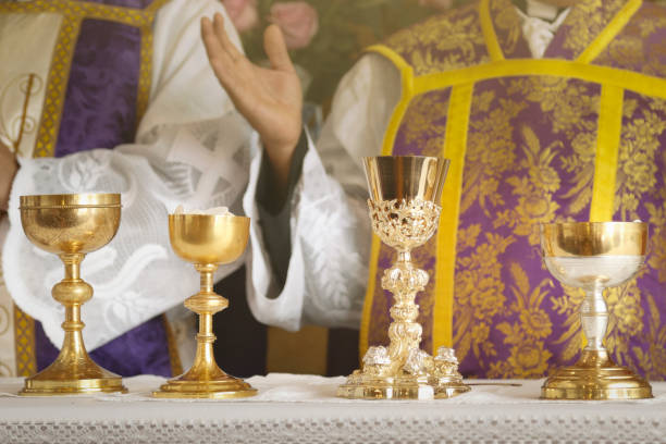istock Goblet and ambula at the altar, prayer and blessing during mass 1451452706