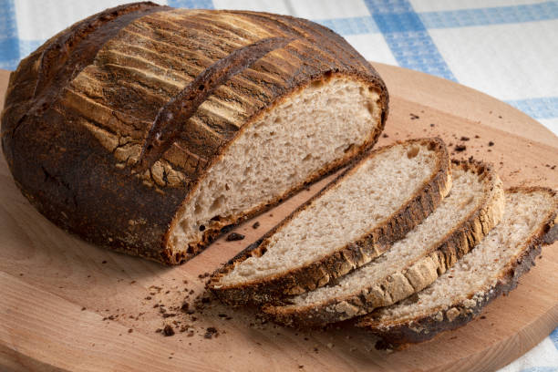 Traditional whole German Eifler Brot and slices close up
