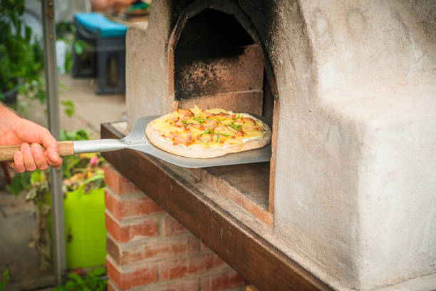 istock Homemade pizza on a shovel 1451457186
