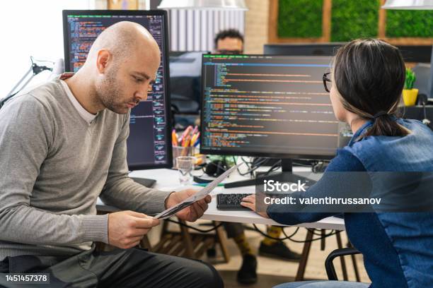 Software Programmers Analyzing Html Code And Database Brainstorming ...