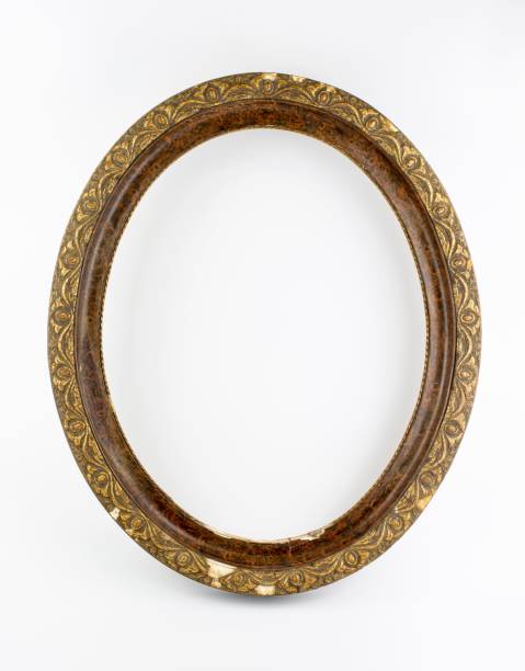 istock Vertical shot of an old vintage oval frame isolated on a white background 1451459515