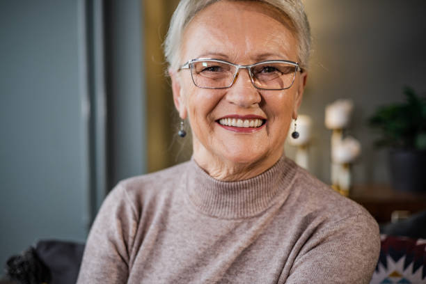 istock Happy and serene senior woman 1451462553