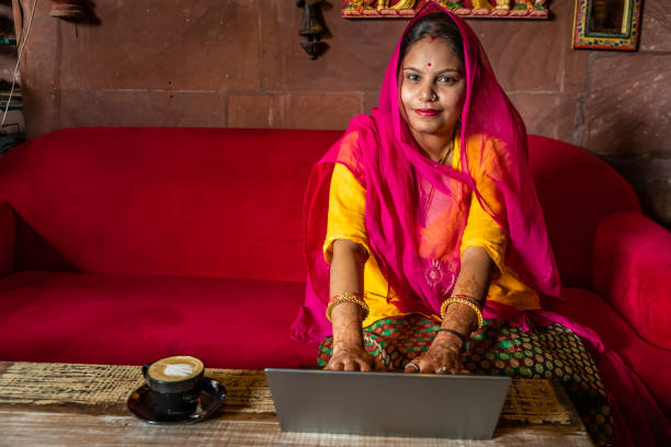 istock Young Indian woman using laptop, Jodhpur, India 1451463472